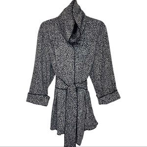 Carole Little 3/4 sleeve zebra print sweater jacket with snap enclosures.